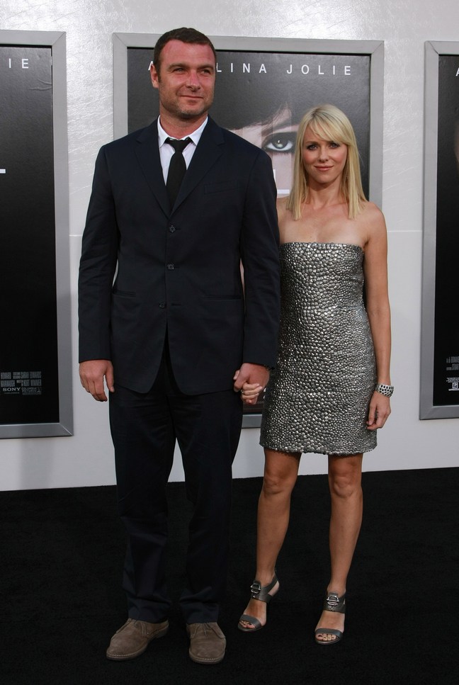 Naomi Watts silver mini dress, silver high heels, liev schreiber suit, brown shoes